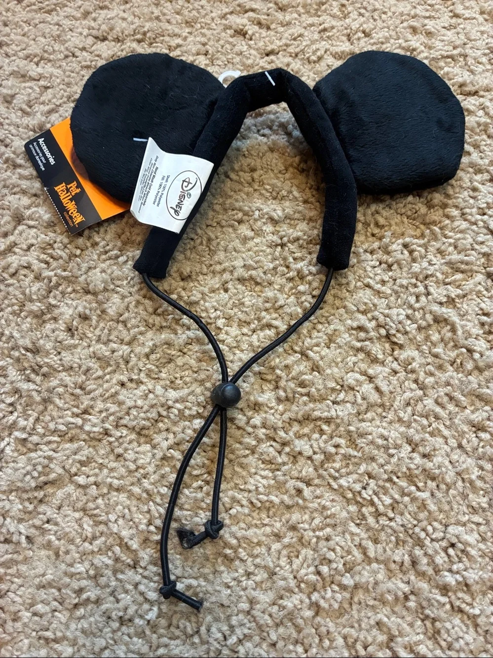 Disney Black Plush Mouse Ear Headband with Orange Tag for dogs.